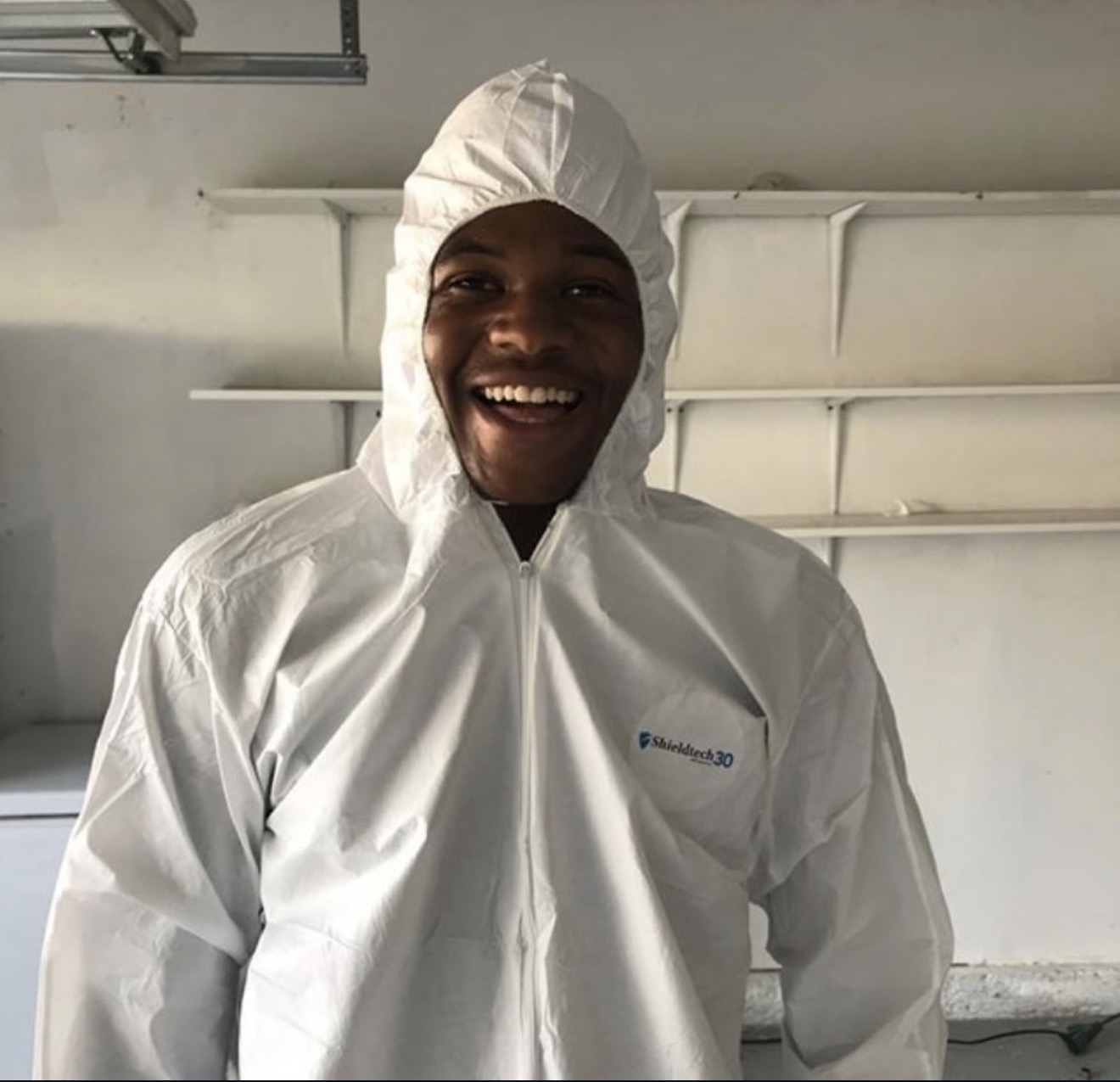 Stink Stompers technician suited up and ready for an odor remediation job in Denver.